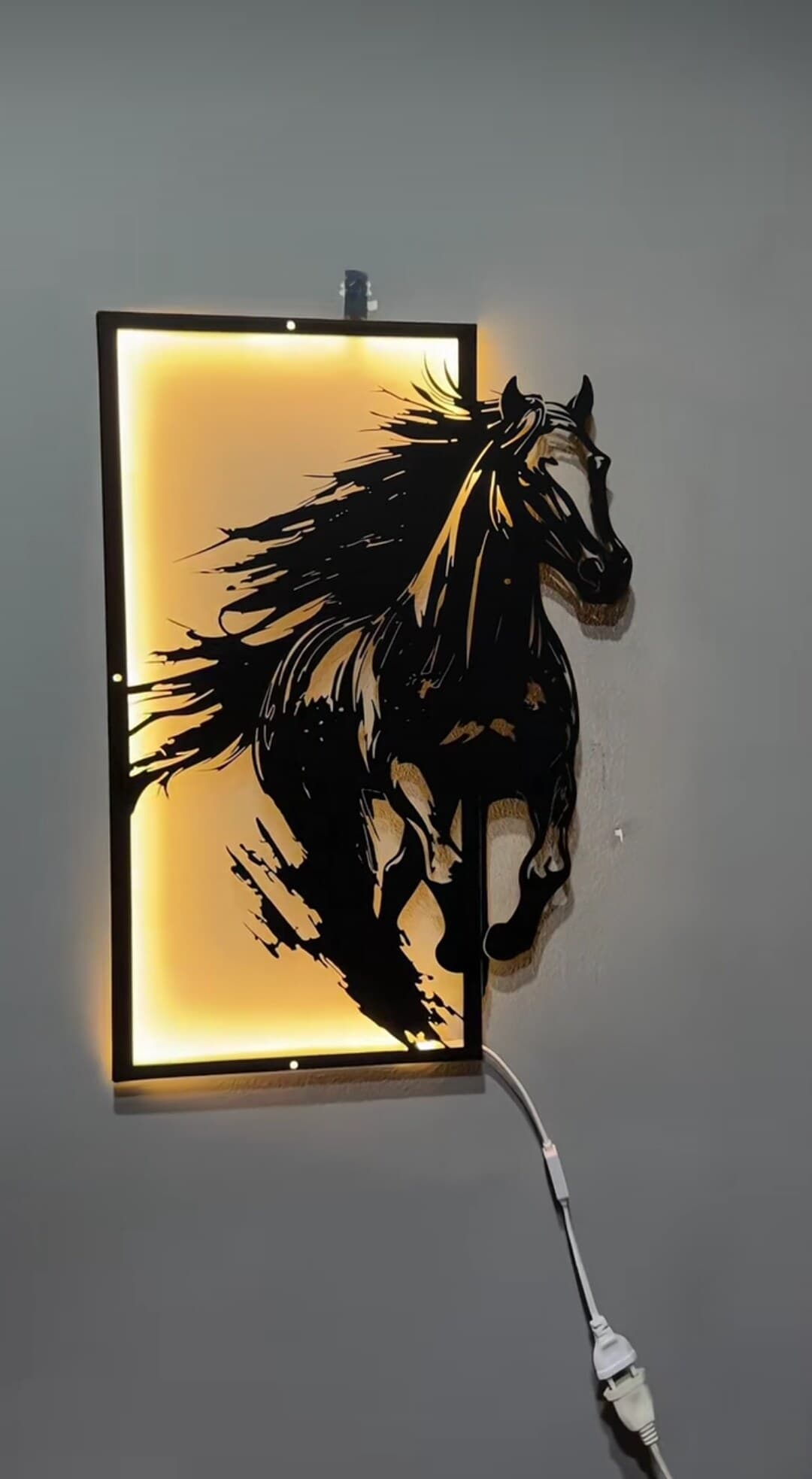 Galloping Horse LED Art, a finished led wall art piece on a wall